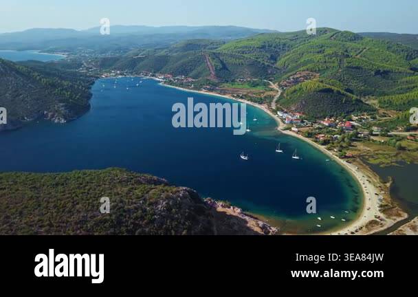 High angle drone shot of sailboats moored in the calm protected waters ...