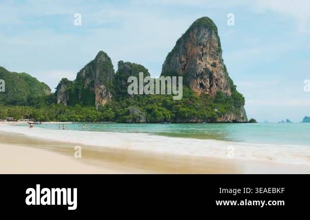 Scenic view of Railay Beach with limestone karst cliffs, sand and ...