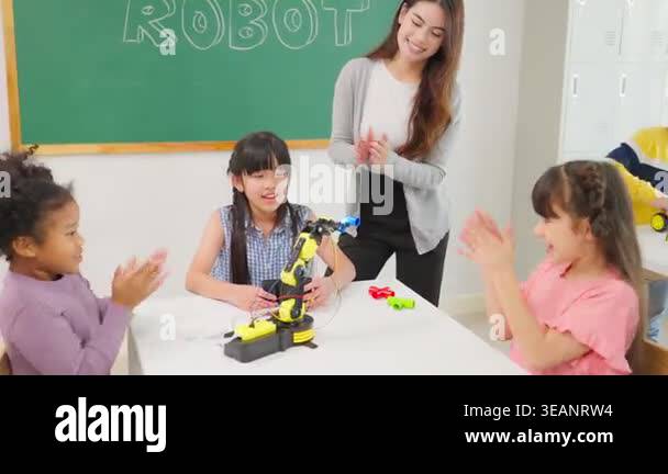Caucasian Woman Teacher Teaching A Lesson To Kids At Elementary School