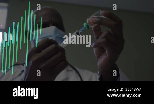 Senior doctor inserting syringe into vial and drawing fluid activating ...