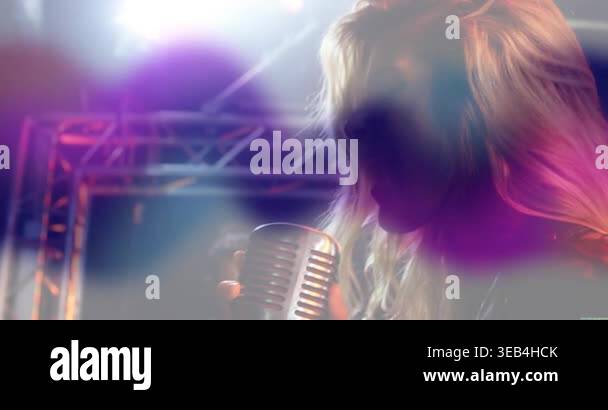 Female singer grabbing mic and singing for performance, guitarist ...
