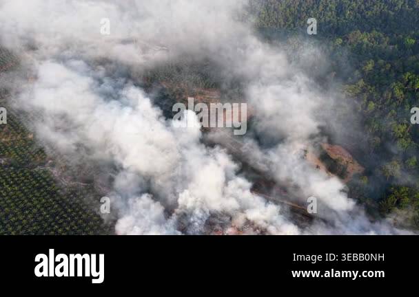 Aerial view shows smoke and active fire burning at a landfill site near ...
