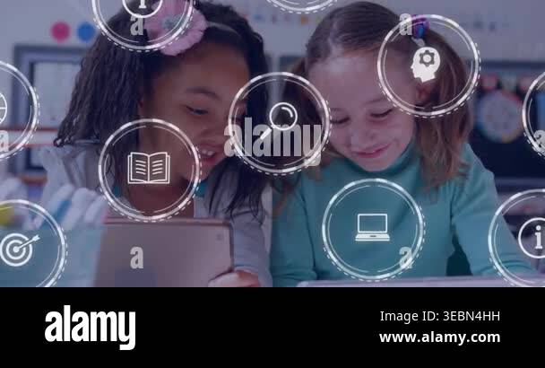 Two female students tapping tablets and leaning for learning, causing ...