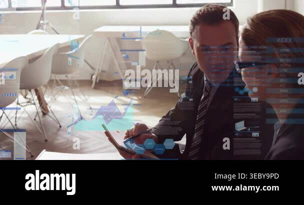 Man pointing pen at pad in office causing animated biz charts growing ...