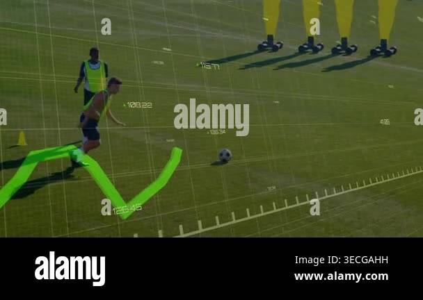 Neon attacker receiving ball, dribbling past training dummies to goal ...