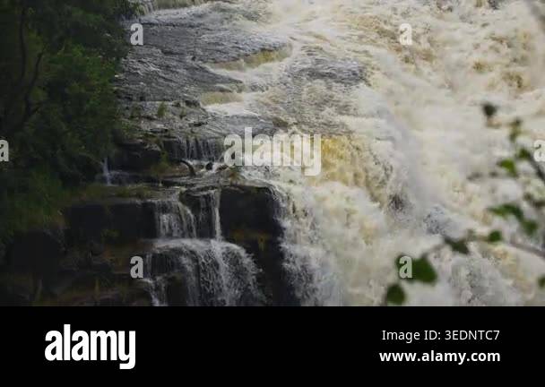 Water cascading over rocks at Victoria Falls, major tourist attraction ...