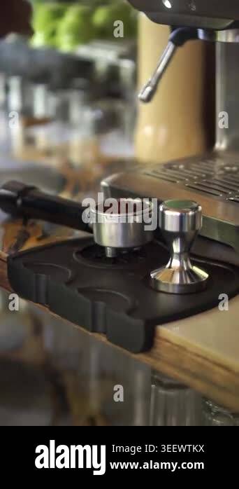 Close-up of a professional coffee machine in a caf, showing the ...
