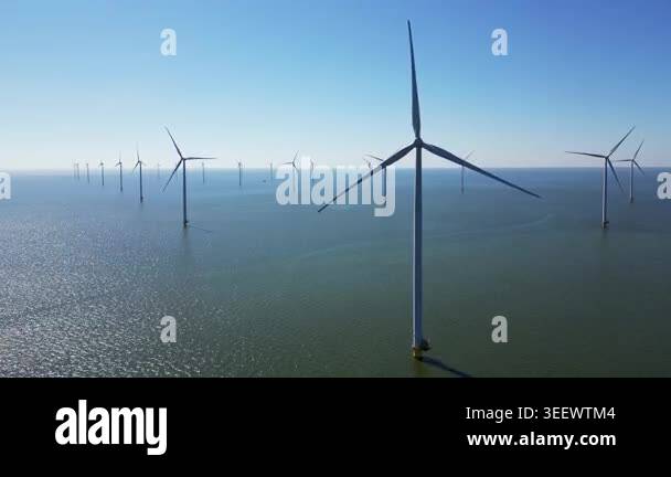 View of Green energy, wind turbines produce energy in the North Sea, wind farm ...