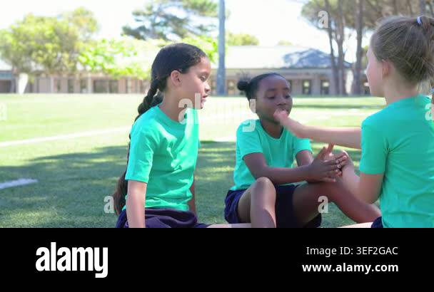 African American girls clapping at school right starting center ...
