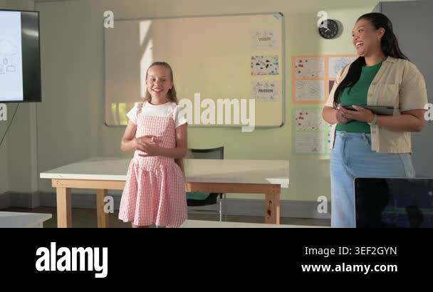 Pink Class Is Full Youth female student in pink dress giving PASSION presentation in ...