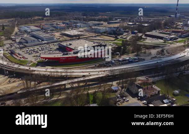 Aleja Riga Rimi High angle aerial shows ALEJA with Rimi and myFitness, cranes, formwork ...