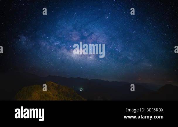 A breathtaking night view of the Milky Way galaxy stretching across the ...