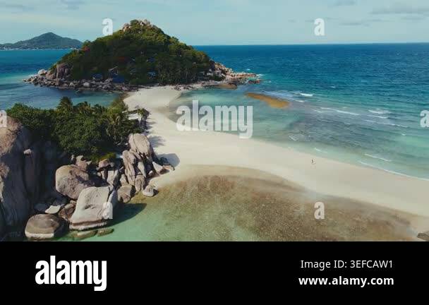 Sunlit Sand Spit Linking Island And Shore, Sweeping Aerial Reveals ...