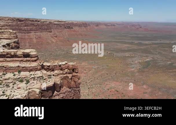 Common Utah Rocks Smooth Smooth aerial straight flight over dramatic sandstone cliffs and deep ...