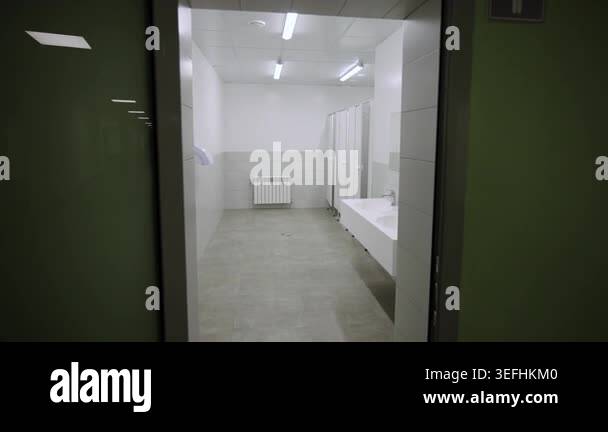 Simple institutional toilet features practical design for users. Tidy ...