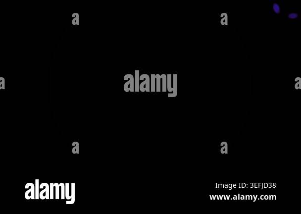 Abstract background with floating glowing blue particles in the dark ...