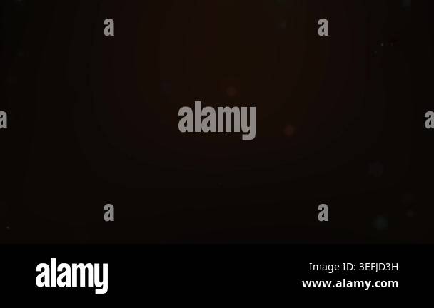 Abstract motion background featuring soft golden dust particles ...