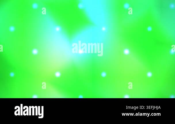 A dynamic motion background featuring soft glowing light particles on a ...