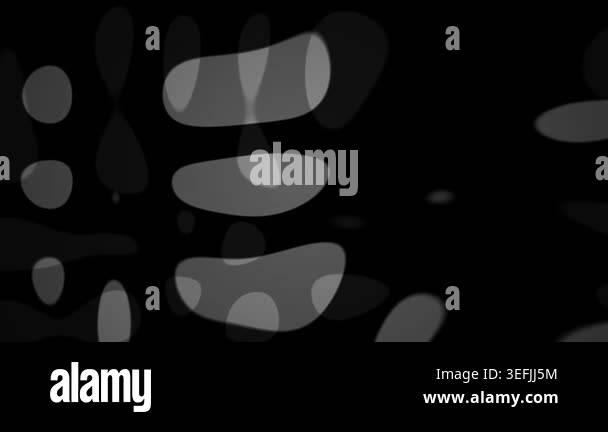 An abstract motion background featuring dark gray rounded organic ...