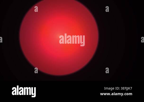 A smooth animation of a glowing red circular light pulsating gently ...