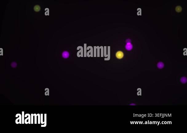 A collection of out-of-focus, colorful bokeh lights in shades of purple ...