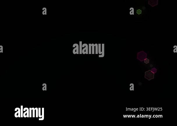 Glowing particles on dark background Stock Video Footage - Alamy
