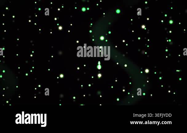 Glowing green and white particles float in a dark space Stock Video ...