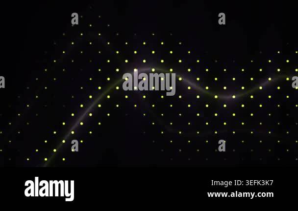 Glowing particles move in trails across a dark background Stock Video ...