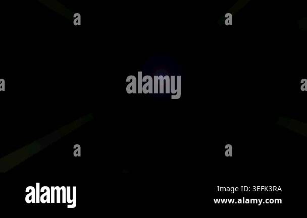 Abstract motion graphic showing particles exploding and radiating from ...