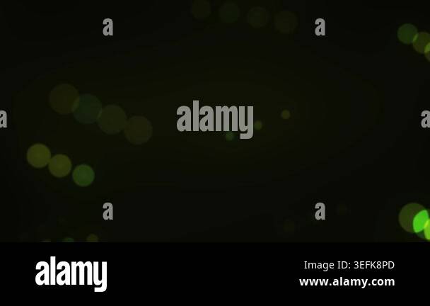 A dynamic animation of glowing green and yellow bokeh spheres drifting ...
