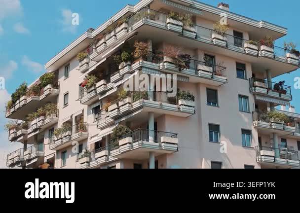 Picture of Detailed exterior facade of contemporary apartment building under ...
