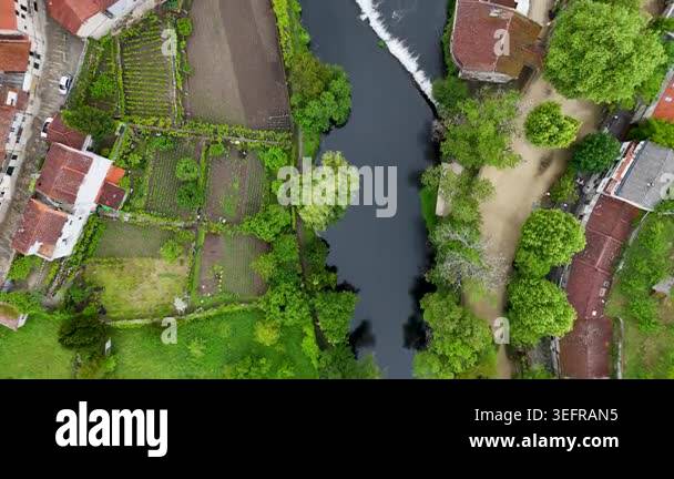 Stunning top down aerial footage following the Arnoia river as it flows ...