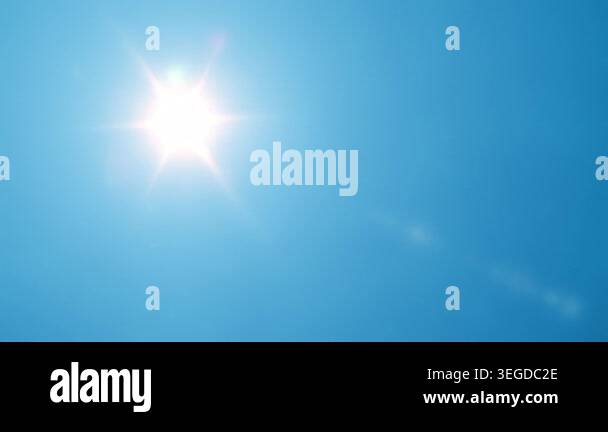 Bright Sun in Blue Sky with Rotating Sun Rays Seamless Summer Loop ...