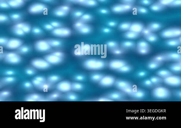 Abstract animation of glowing blue bioluminescent cells or particles ...