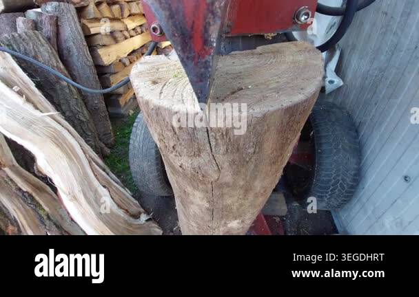 Splitting firewood with electric hydraulic homemade machine for winter ...