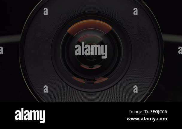 Front view macro of a wide angle camera lens with dark glass, circular ...