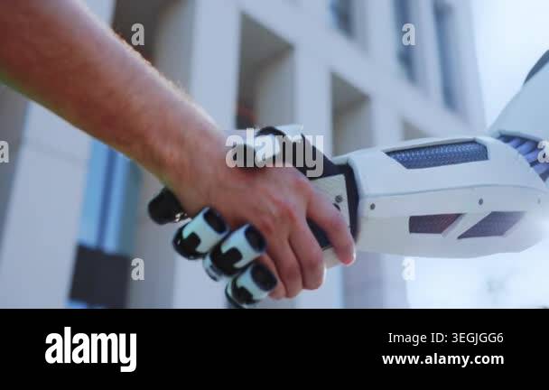 office facade handshake caucasian entrepreneur grips robotic partner in ...