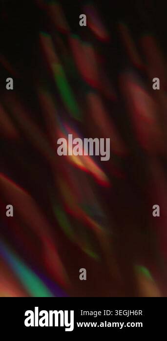 Vertical video. Holographic light blur. Beam prism. Rainbow color ...