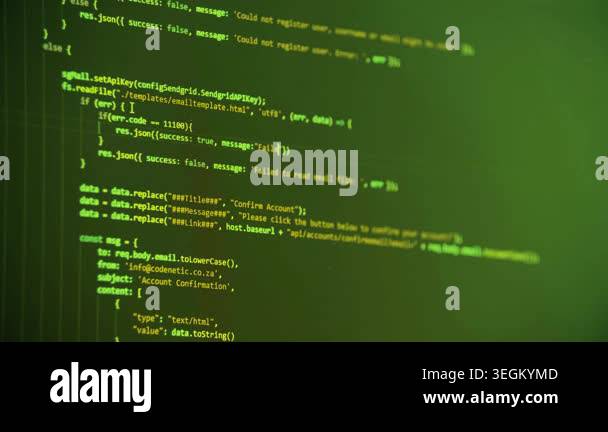 A detailed close-up of green computer code displayed on a screen ...