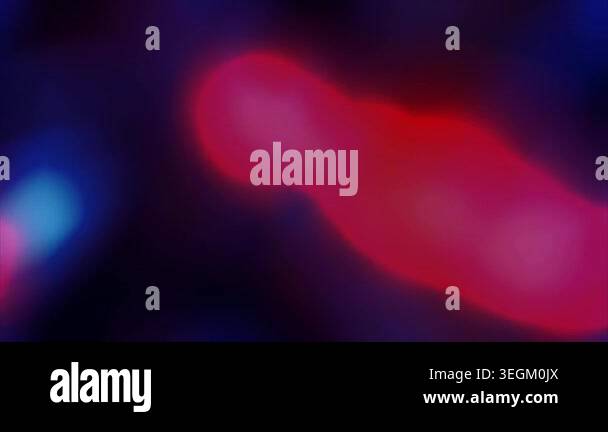 A glowing red light streak moves across a dark background Stock Video ...