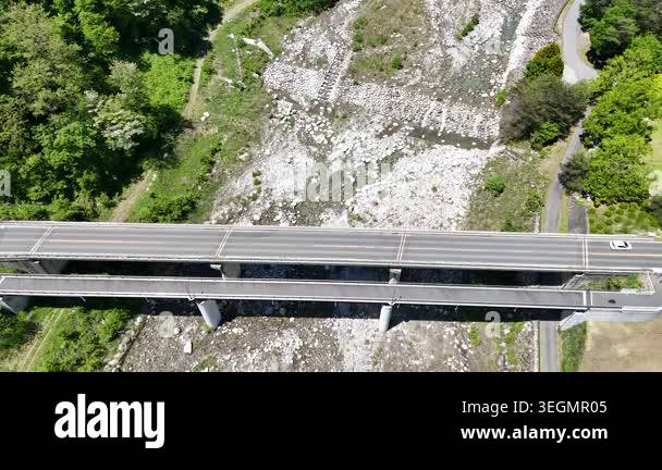 Aerial view of empty road over rocky terrain Stock Video Footage - Alamy