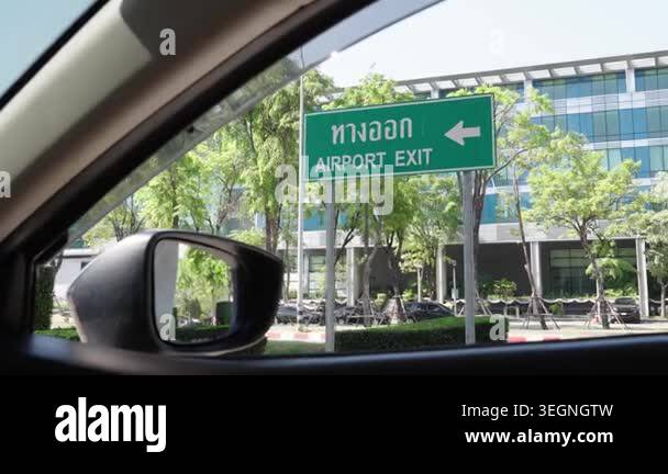 Airport Exit Sign Viewed From Car Window While Driving Toward Airport ...