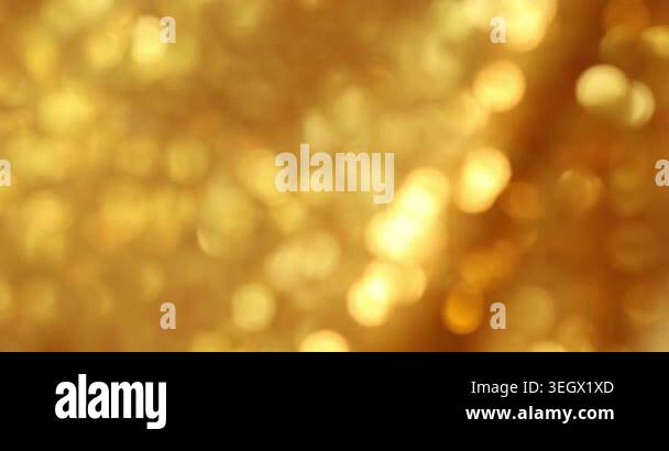 Golden bokeh background abstract with soft glowing lights and elegant ...