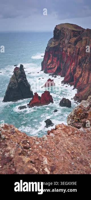 Dramatic view of rock formations and crashing ocean waves landscape ...