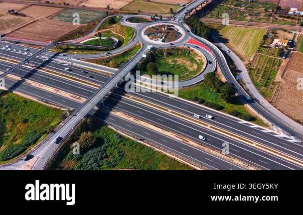 Roundabout Ramp Terminals Aerial highway interchange with roundabout and agricultural fields ...