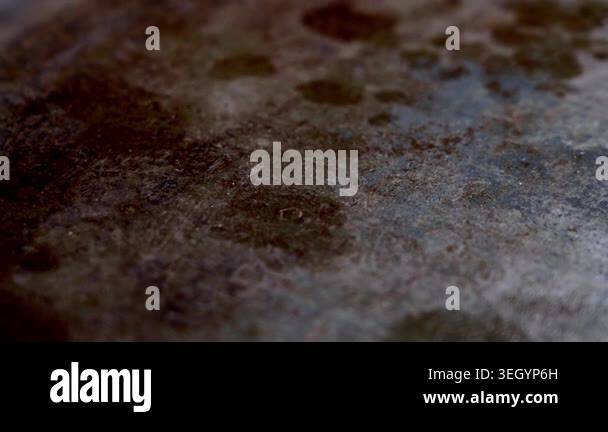 Dark burned oven tray texture with rusty stains and greasy cooking ...