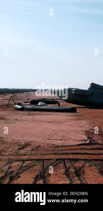 Abandoned Cargo Plane On Sandy Beach, Broken Wing And Tire Tracks In ...