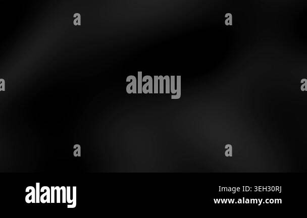 An abstract dark background featuring a subtle, flowing fabric texture ...