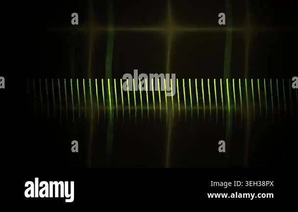 Glowing yellow light trails on a black background with grid pattern ...