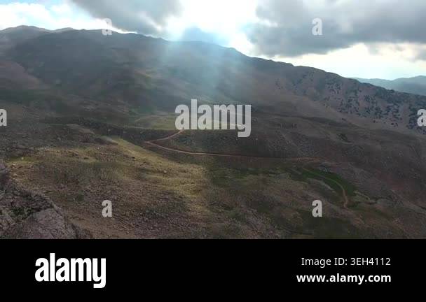 Rocky mountains span in the Pyrenees, revealing barren ridges, sparse ...